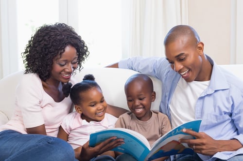 Family reading a book