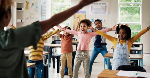 kids dancing in classroom