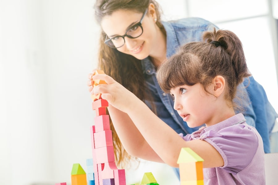 child playing with blocks