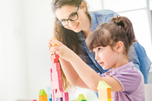 child playing with blocks