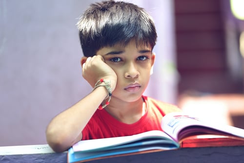Young student upset and frustrated with school